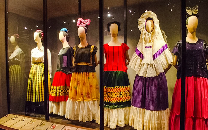 Traditional Mexican dresses on display at the Frida Kahlo Museum in Mexico City.