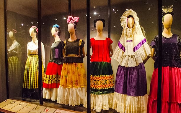 Traditional Mexican dresses on display at the Frida Kahlo Museum in Mexico City.