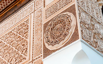 Bahia Palace intricate wall carvings in Marrakech, Morocco.