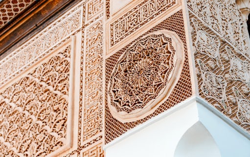 Bahia Palace intricate wall carvings in Marrakech, Morocco.