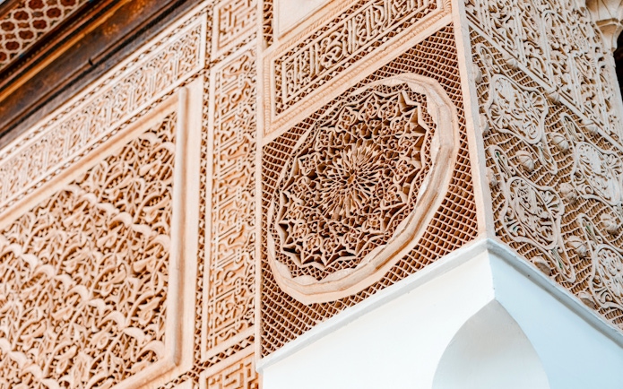 Bahia Palace intricate wall carvings in Marrakech, Morocco.