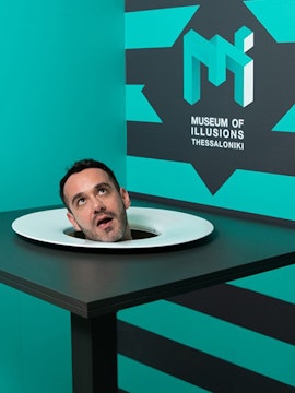 Head illusion exhibit at Museum of Illusions Thessaloniki.