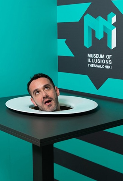 Head illusion exhibit at Museum of Illusions Thessaloniki.