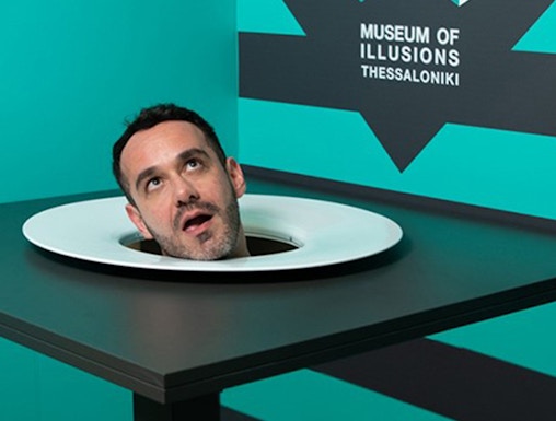 Head illusion exhibit at Museum of Illusions Thessaloniki.