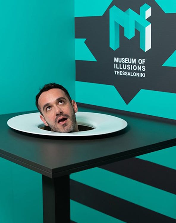 Head illusion exhibit at Museum of Illusions Thessaloniki.