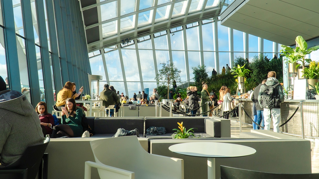 Visitors enjoying the view and greenery at Sky Garden, London.