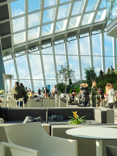 Visitors enjoying the view and greenery at Sky Garden, London.
