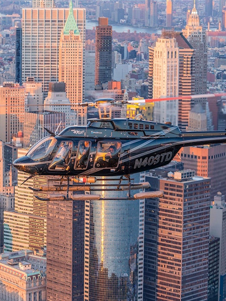Helicopter flying over New York City skyline during 20-minute tour.
