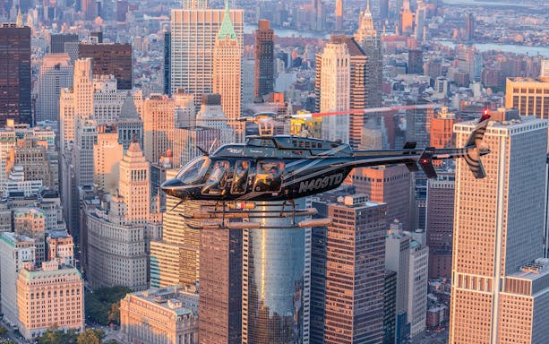 Helicopter flying over New York City skyline during 20-minute tour.