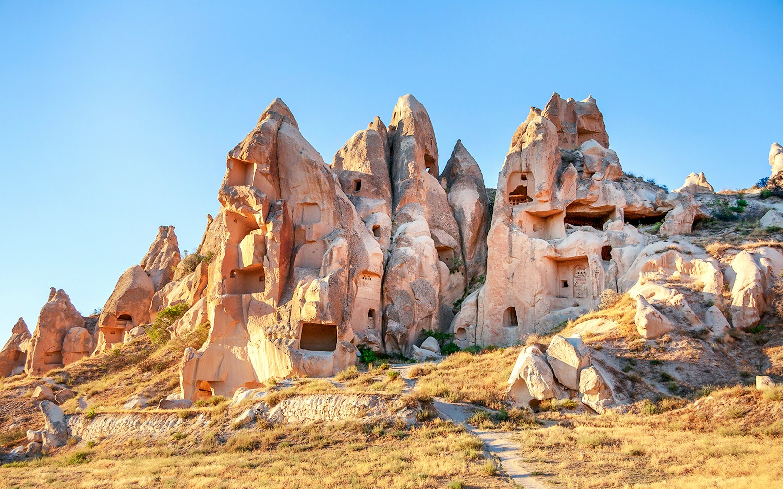 Rock-cut churches and dwellings at Goreme Open Air Museum, Cappadocia, Turkey.