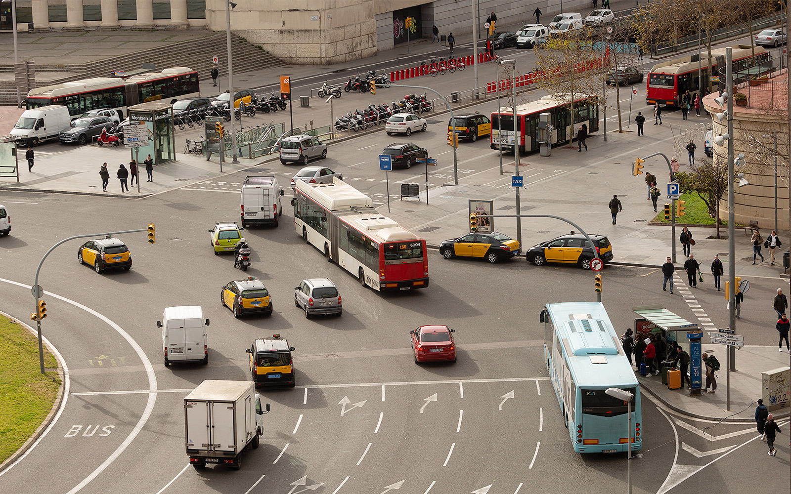 Tourists exploring a museum in Barcelona with the All Inclusive Card, offering access to over 25 museums and transportation services