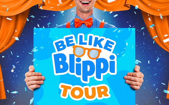 Be Like Blippi Westend tour poster with orange curtains and confetti.