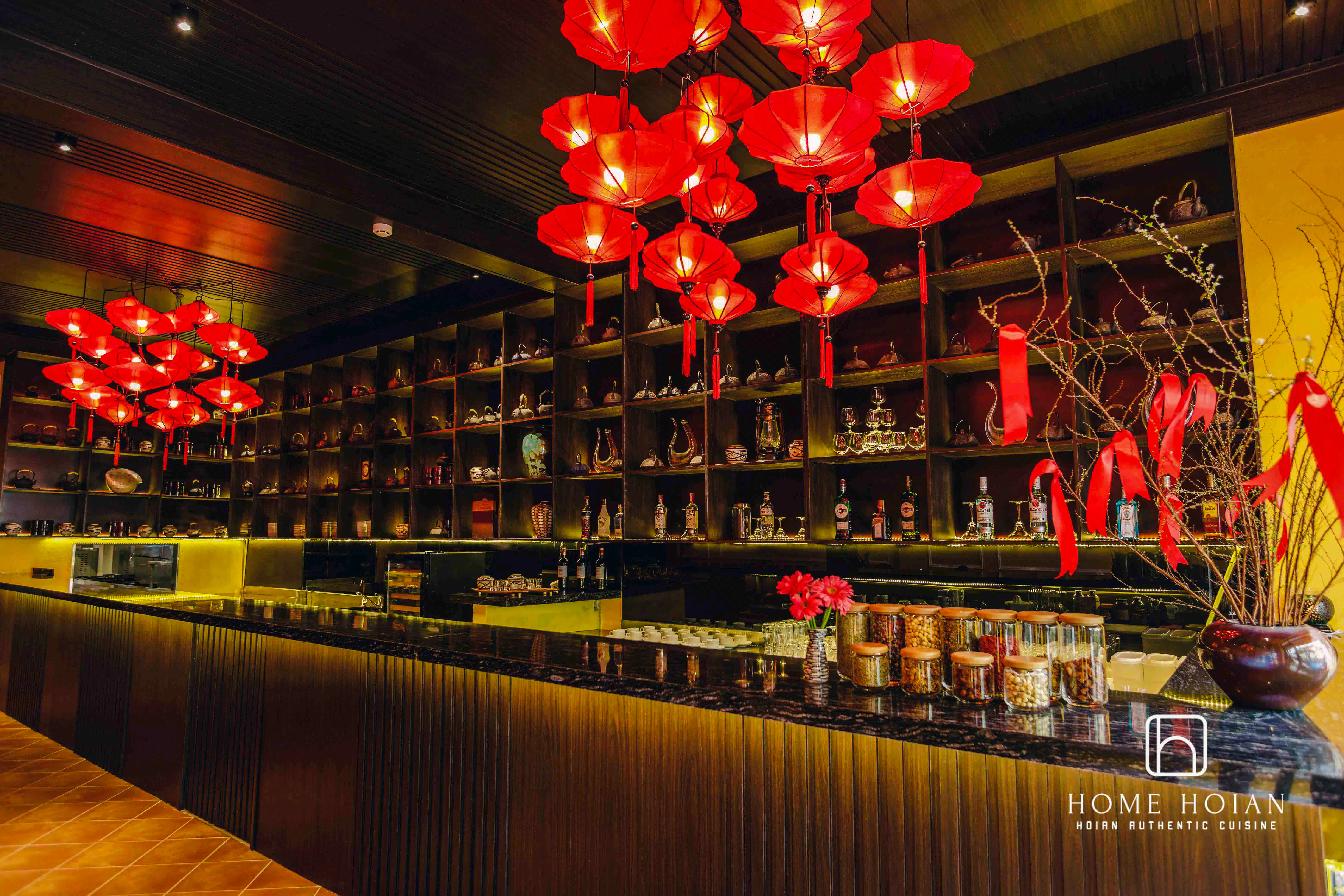 Red lanterns and traditional decor at HOME Hoi An Restaurant, all-you-can-eat Vietnamese dining, Hoi An.