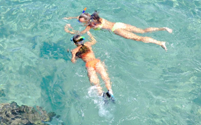 Snorkelers exploring clear waters during Koh Samui Ang Thong day tour.
