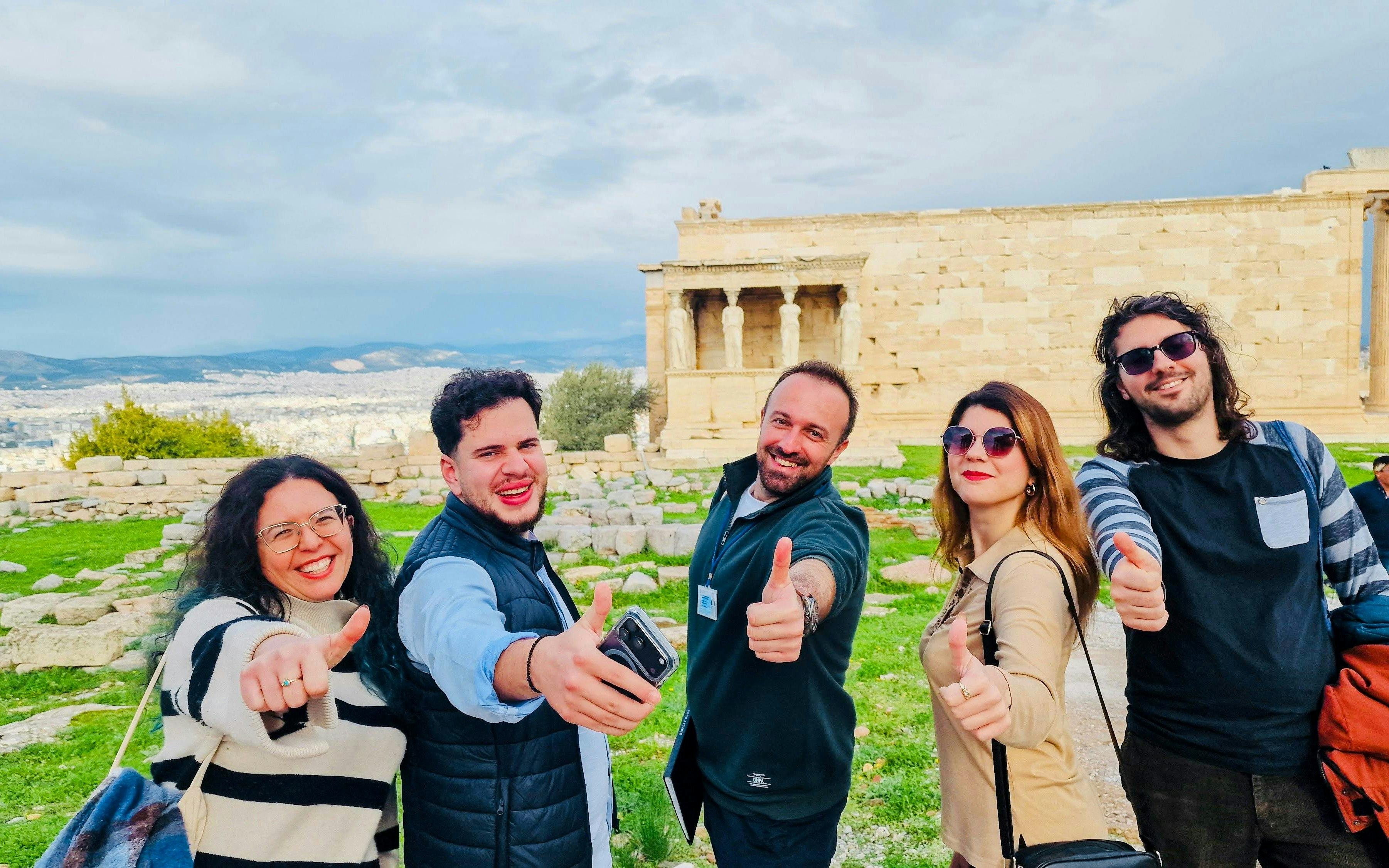 Small group enjoying a tour at the Erechtheion, Acropolis, Athens.