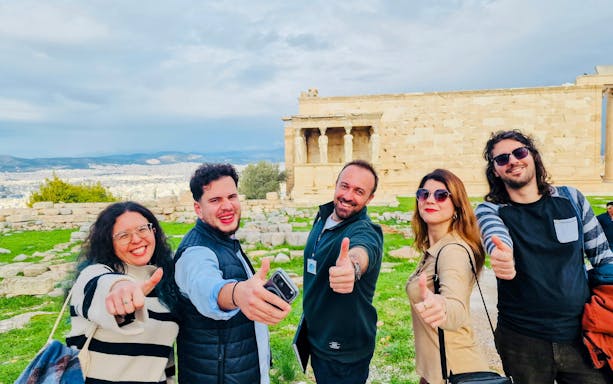 Small group enjoying a tour at the Erechtheion, Acropolis, Athens.