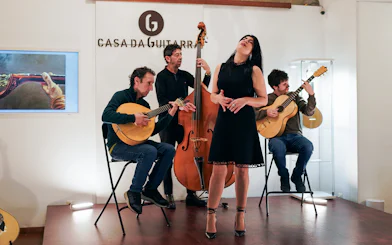 Musicians performing with Isa de Castro at Casa da Guitarra, Porto.