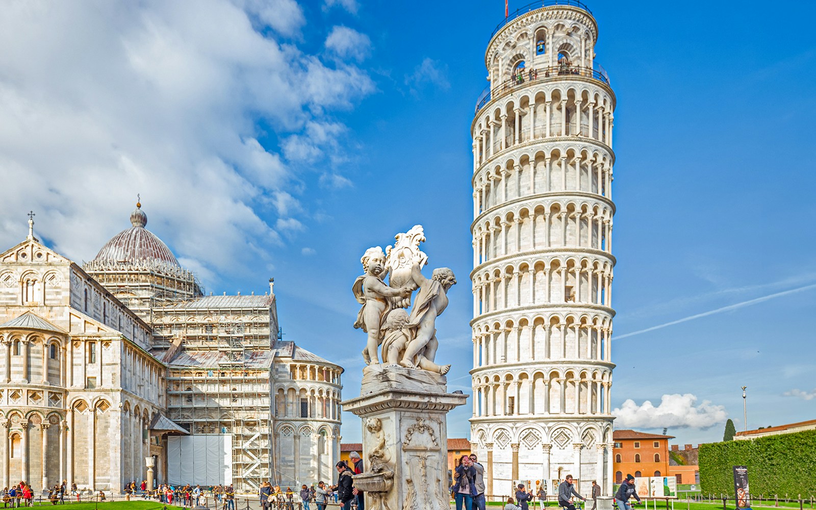 Leaning Tower of Pisa and Pisa Cathedral at Square of Miracles, Italy.