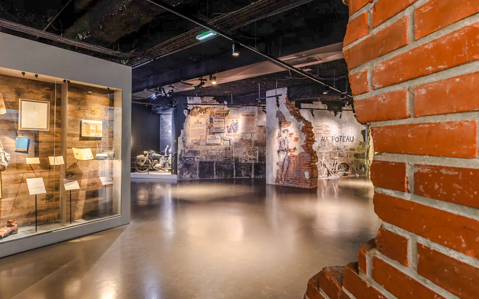 Exhibit of wartime artifacts and murals at Mémorial de Caen, Normandy, France.