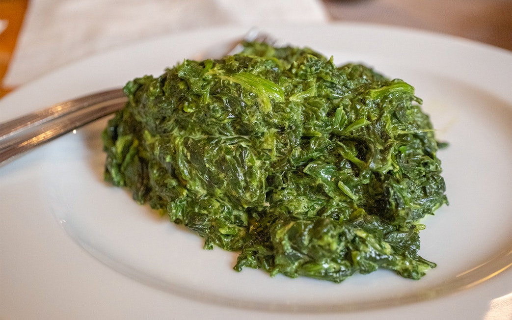 Creole Creamed Spinach served on Steamboat Natchez Dinner cruise plate.