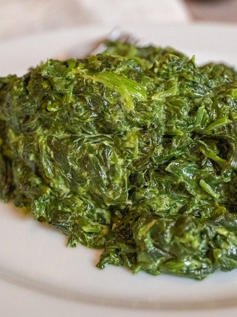 Creole Creamed Spinach served on Steamboat Natchez Dinner cruise plate.