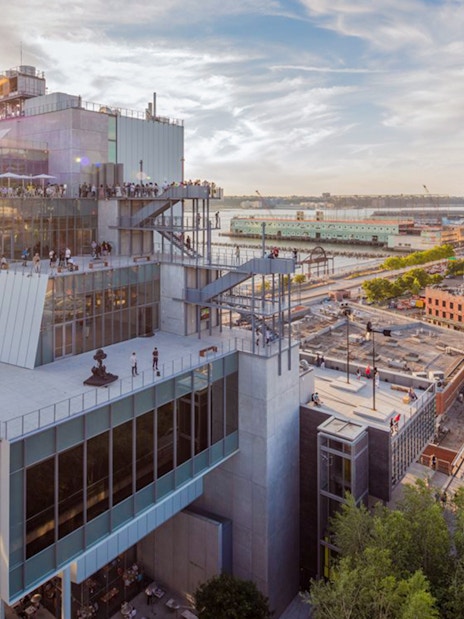 Whitney Museum of American Art exterior with cityscape and river view.