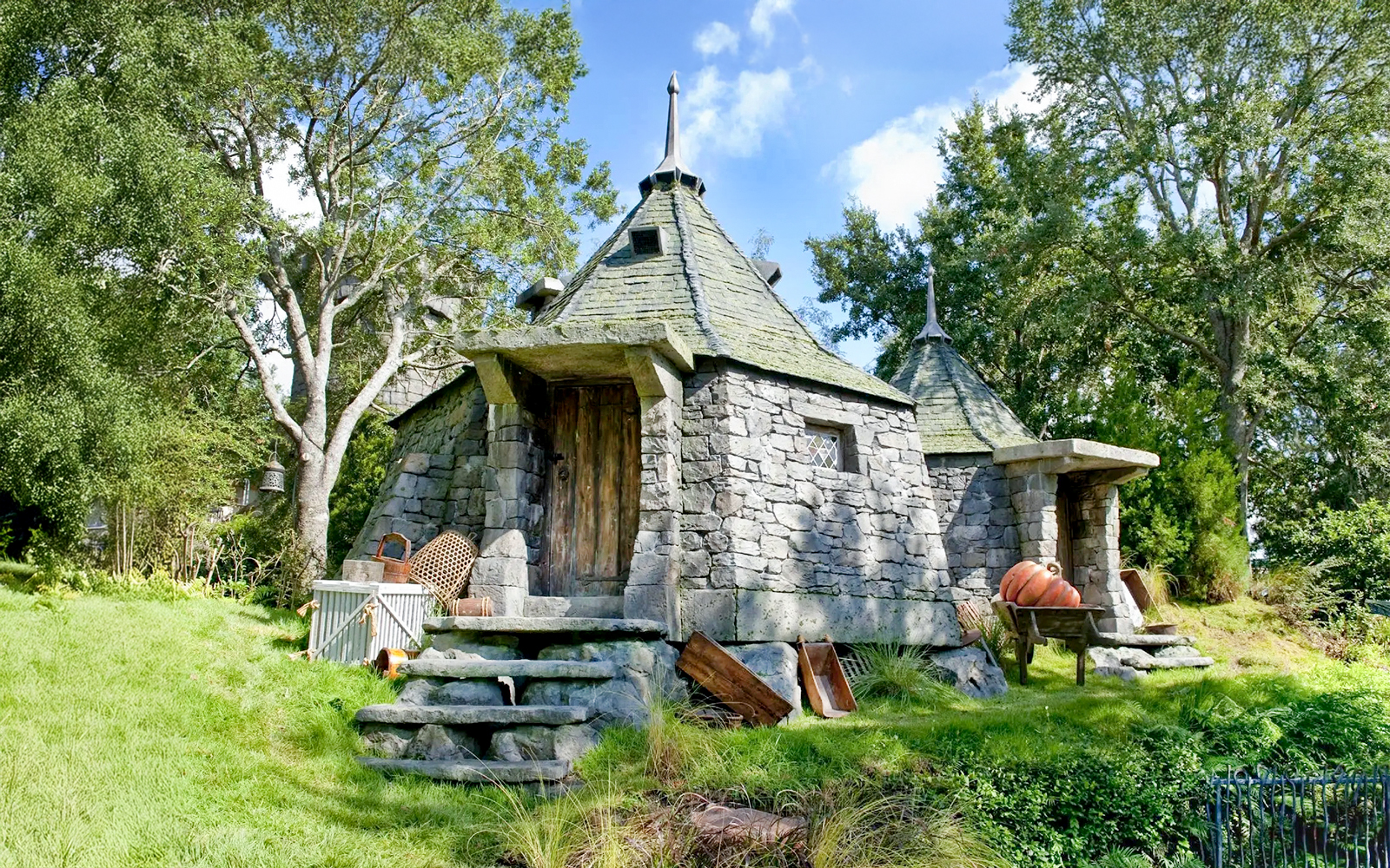 Hagrid's stone hut with pumpkins at Universal Studios Orlando Harry Potter attraction.