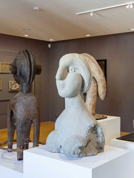 Sculptures and paintings in a gallery at the Picasso Museum, Barcelona.