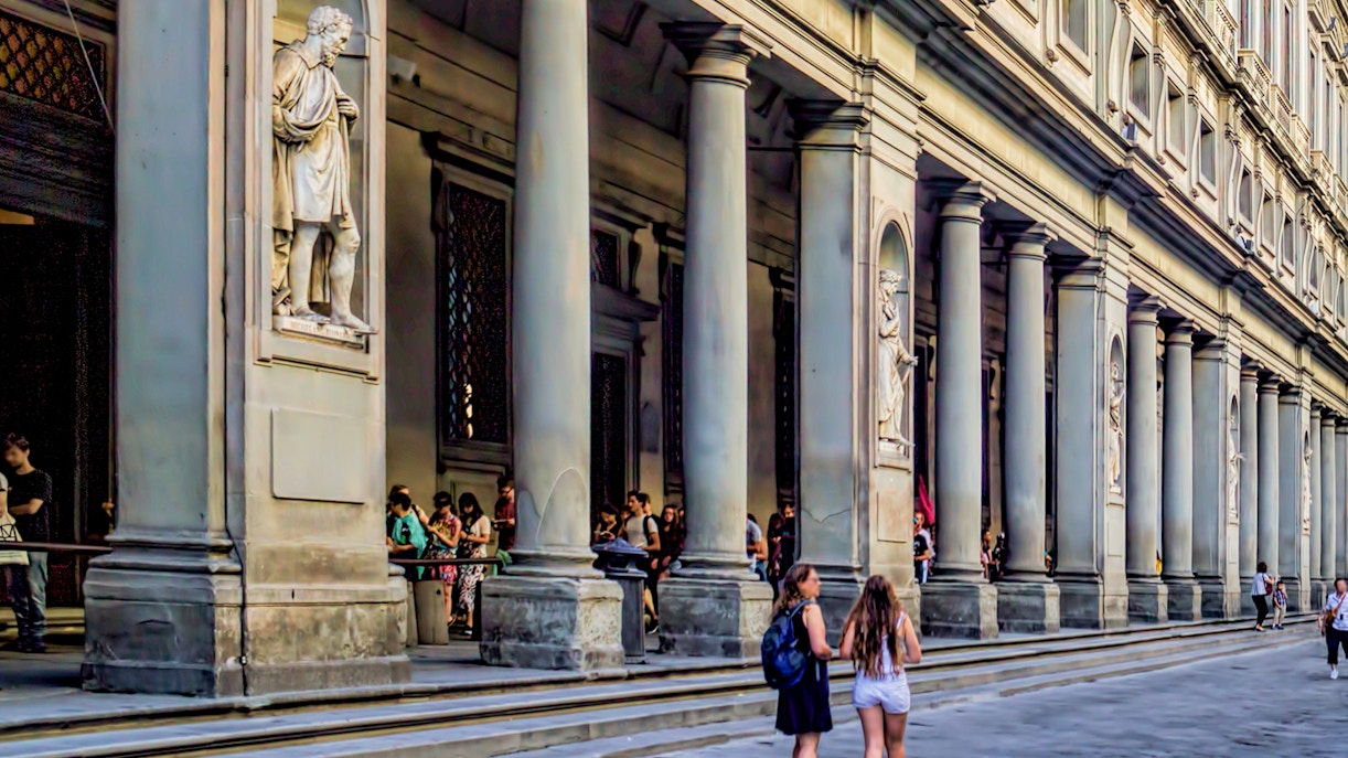 Visitors waiting in line at Uffizi Gallery, Florence, gate 1, door 1.