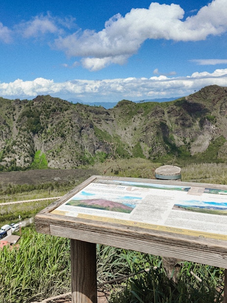 Information board overlooking Mount Vesuvius crater in Italy.