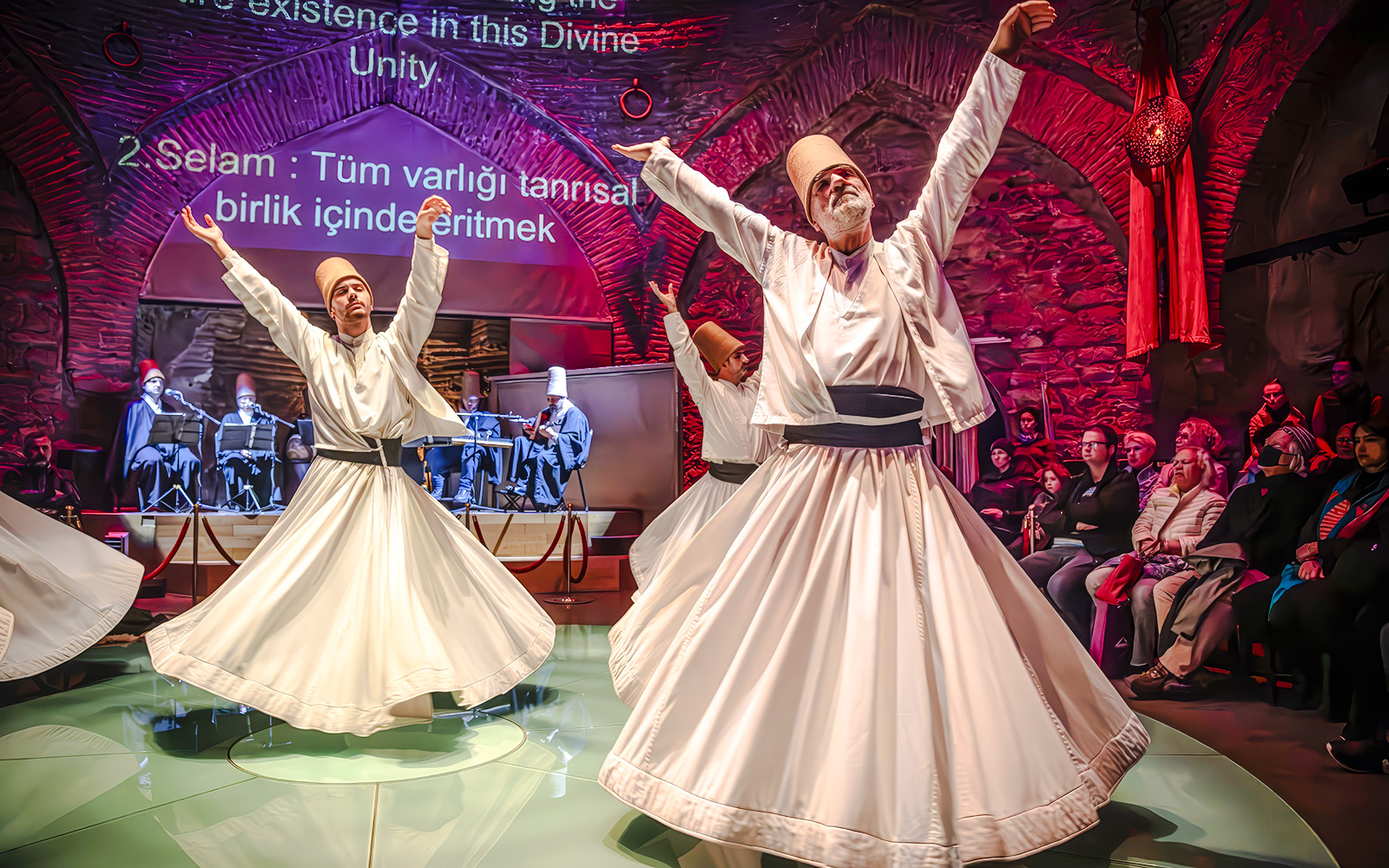 Whirling dervishes performing at Hodjapasha Cultural Center in Istanbul.
