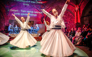 Whirling dervishes performing at Hodjapasha Cultural Center in Istanbul.