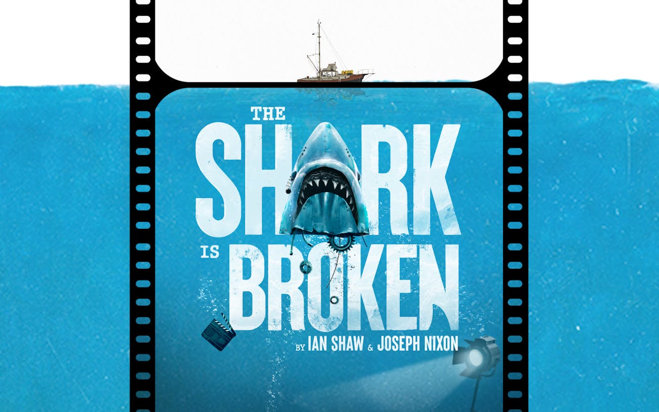 The Shark is Broken" poster with a shark and a boat above.
