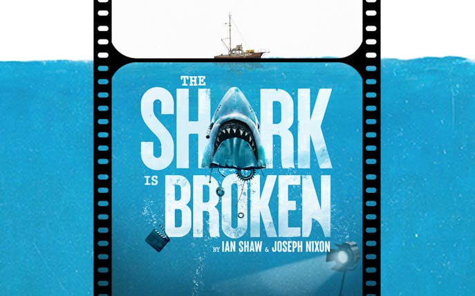 The Shark is Broken" poster with a shark and a boat above.