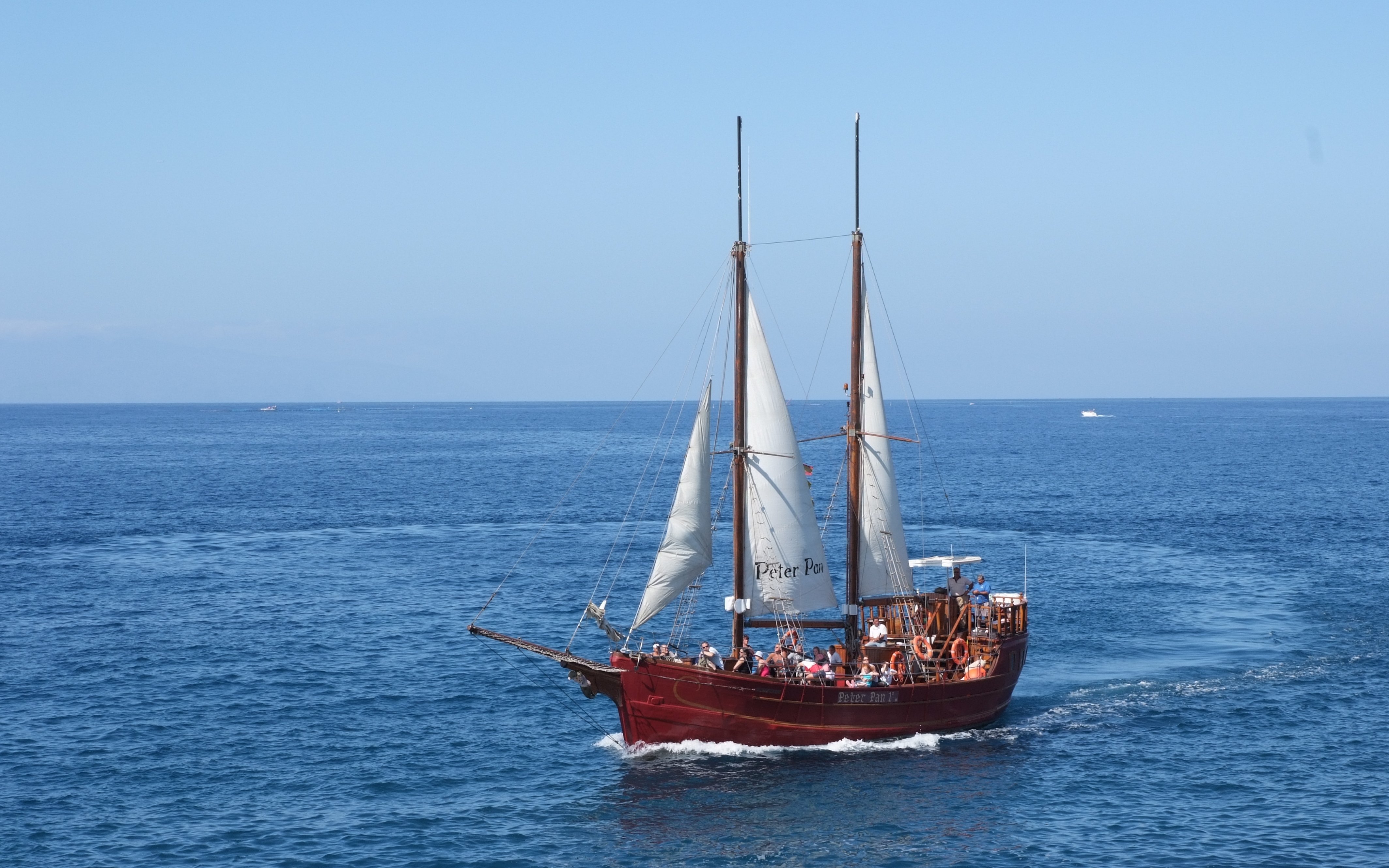 Tourists on Peter Pan Pirate boat for whale and dolphin watching in Tenerife.