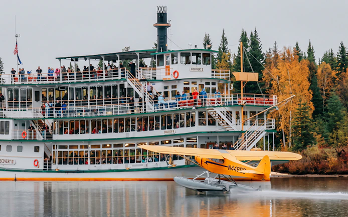 Riverboat Discovery and floatplane on Chena River during Ultimate Fairbanks Day Tour.