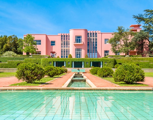 Serralves Gardens lush greenery with walking paths in Porto, Portugal.