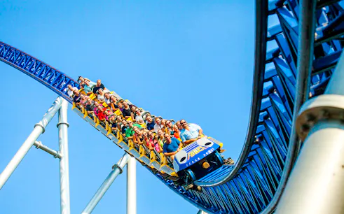 Riders on Millennium Force roller coaster at Cedar Point, Ohio.