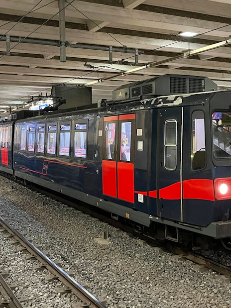 Campania Express train at Napoli Garibaldi station platform.