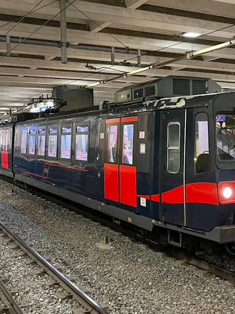 Campania Express train at Napoli Garibaldi station platform.