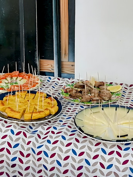 Tapas selection on a table for lunch during a whale watching luxury boat experience.