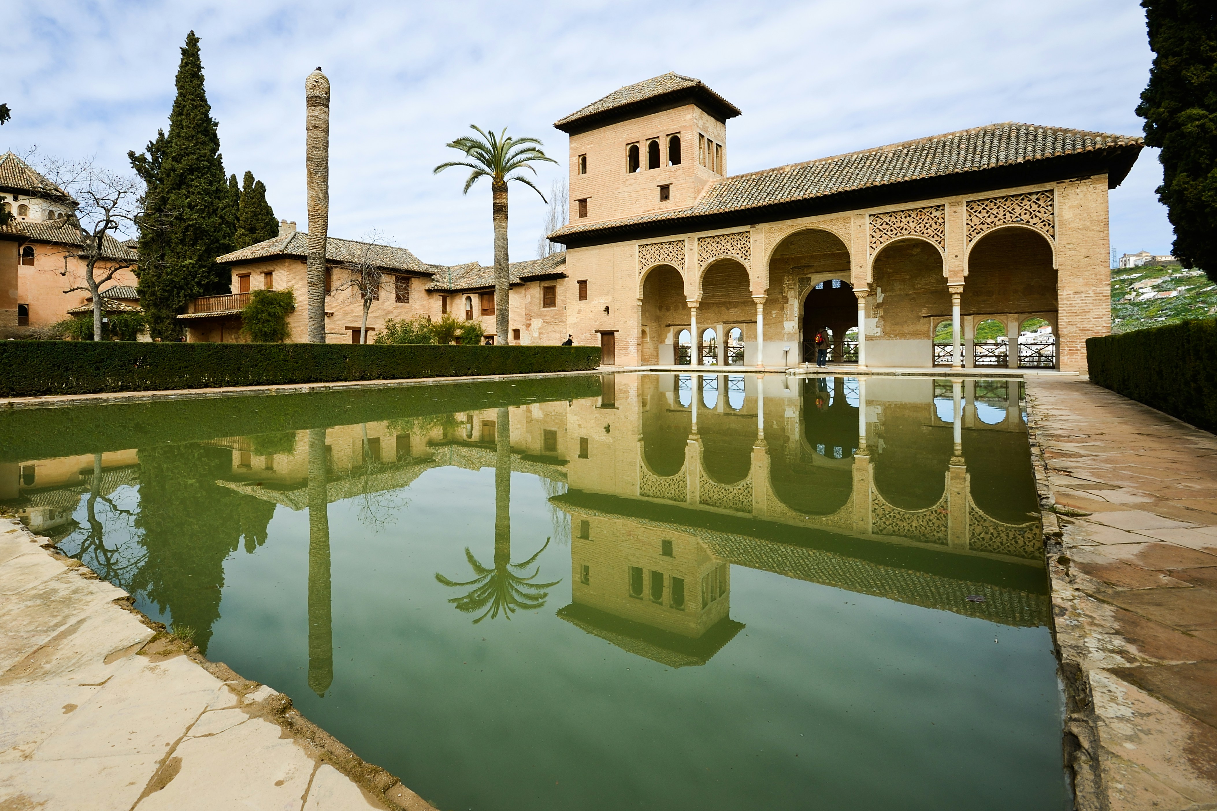 Partal Palace with reflecting pool and gardens in the Alhambra complex, Granada, Spain.