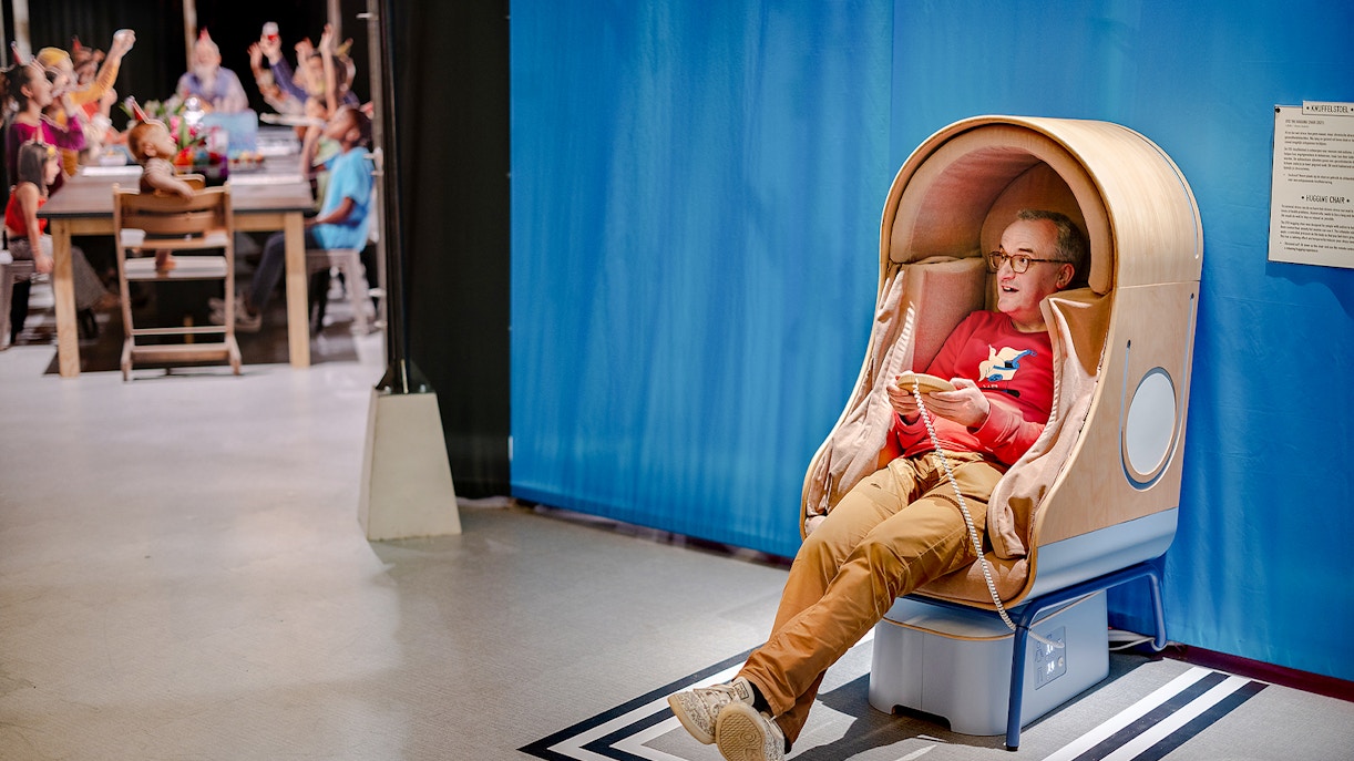 Visitor interacting with an exhibit at NEMO Science Museum, Amsterdam.
