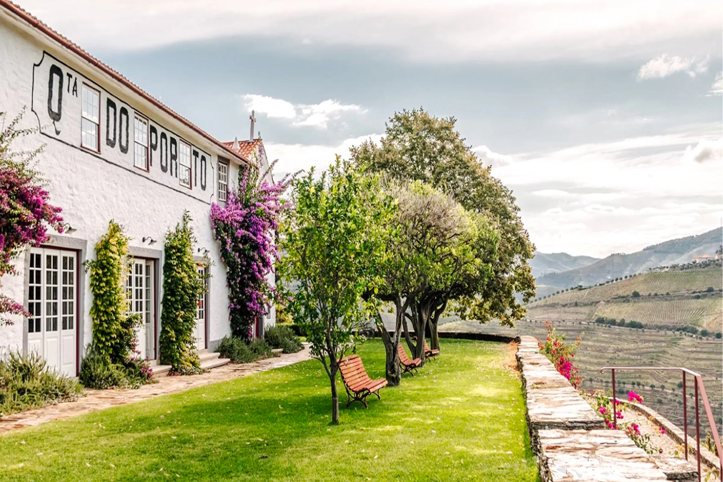 Ferreira Port Wine Cellar exterior with vineyard view in Porto.