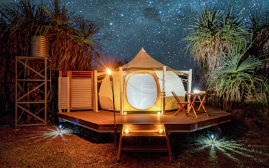 Overnight safari tent under starry sky at Finniss River, near Darwin.