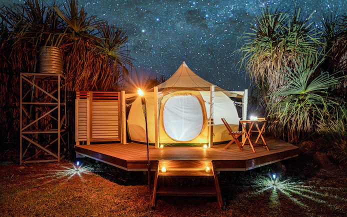 Overnight safari tent under starry sky at Finniss River, near Darwin.