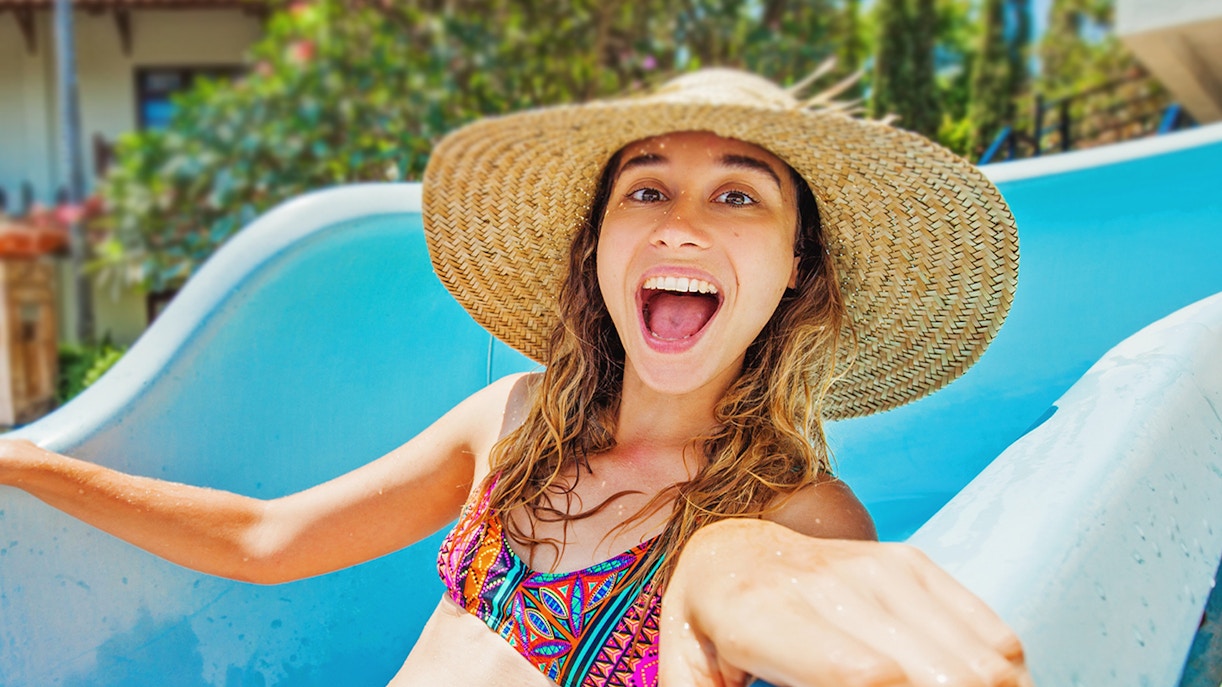 wearing a hat in waterpark