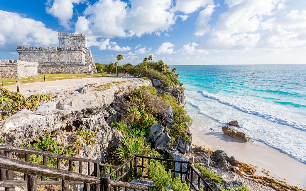 Tulum Wind God temple overlooking the Caribbean Sea in Mexico.