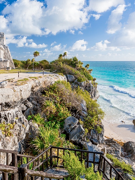 Tulum Wind God temple overlooking the Caribbean Sea in Mexico.