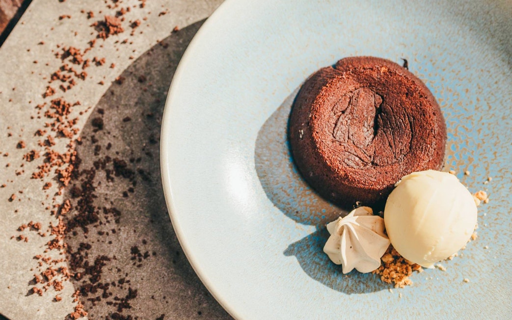 Chocolate lava cake with ice cream at Coloured Earth, Chamarel, Mauritius.